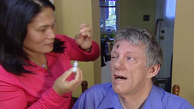 <b>Terry Orchard&#39;s</b> wife administers eyedrops - image