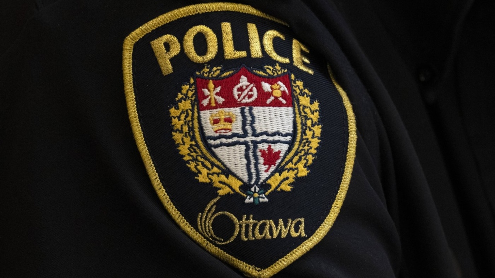 A close-up of an Ottawa Police officer’s badge is seen, in Ottawa, Thursday, April 28, 2022. Ottawa Police Service (OPS) says more than 20 people overdosed over the weekend. THE CANADIAN PRESS/Adrian Wyld