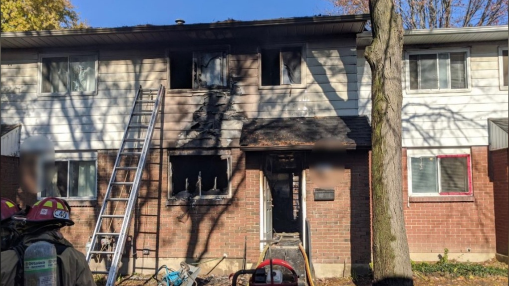 Ottawa firefighters were called to a townhouse on Morrison Drive Sunday, Nov. 7, 2021, for a fire. No one was hurt. (Photo courtesy: Scott Stilborn / @OFSFirePhoto / Twitter)