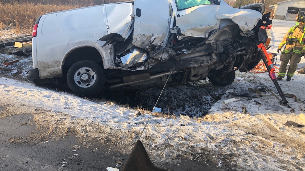 Ottawa firefighters stabilized a vehicle that flipped onto its side in a ditch on Tenth Line Road Wednesday morning. (Photo courtesy: Ottawa Fire Service)