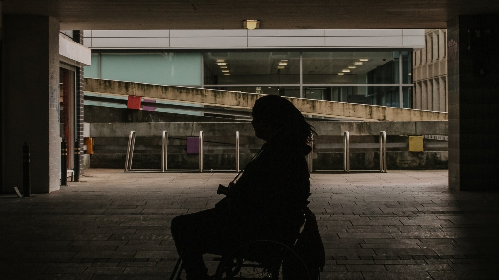 File photo of person in wheelchair. (Nathan McDine/Unsplash)