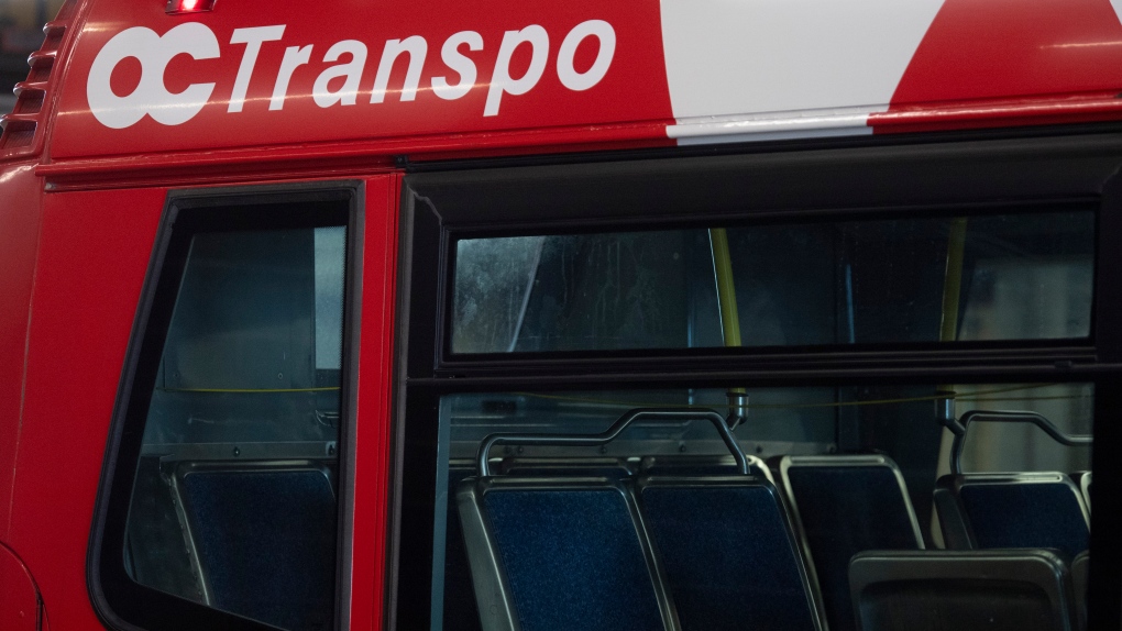 An OC Transpo bus is seen at a public transit garage in Ottawa, Thursday March 4, 2021. (Adrian Wyld/THE CANADIAN PRESS)