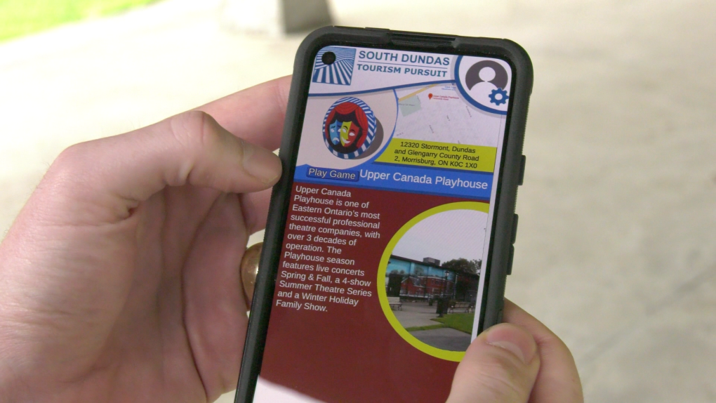 Phone Screen displaying Tourism App
