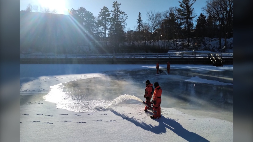 Workers flooding the Rideau Canal on Monday, Jan. 3, 2022. (Kate Malloy/Twitter)