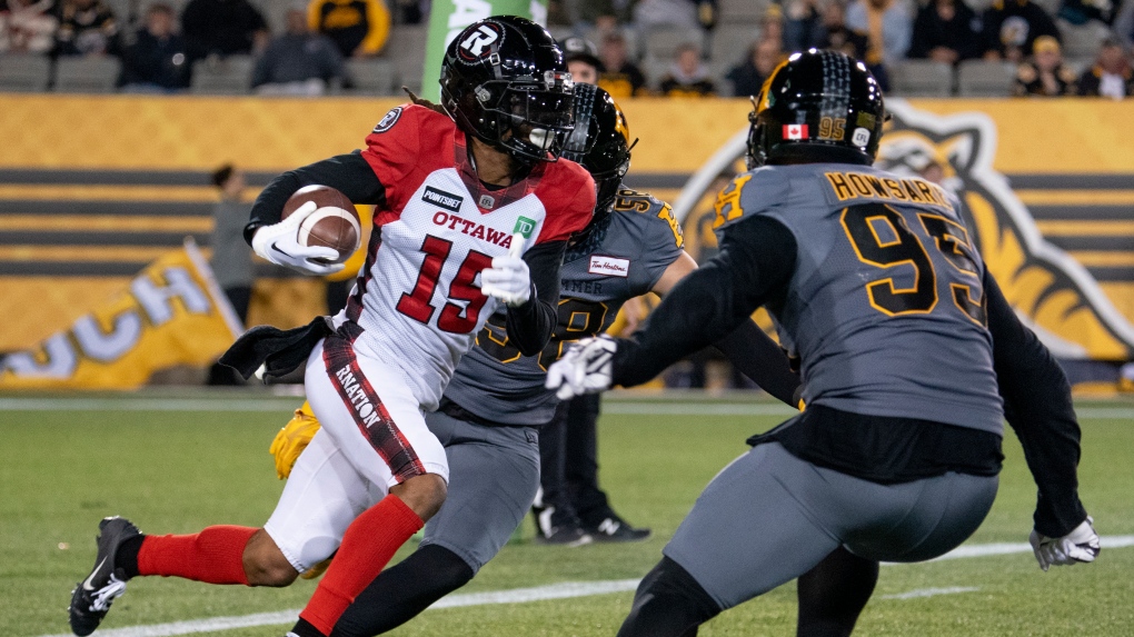 Ottawa Redblacks wide receiver Ryan Davis (15) carries the ball during first half CFL football game action against the Hamilton Tiger-Cats in Hamilton, Ont. on Friday, October 21, 2022. (Peter Power/THE CANADIAN PRESS)