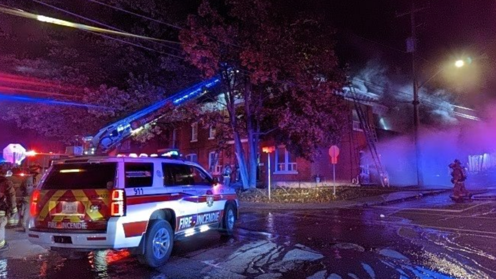 Ottawa firefighters battle a blaze in an abandoned building on Besserer Street. Oct. 8, 2022. (Scott Stilborn/OFSFirePhoto/Twitter)