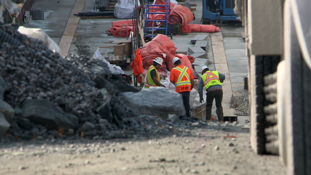 Construction workers on Ottawa's LRT project. The western extension is now due to open in late 2026, 17 months behind schedule. (Leah Larocque/CTV News Ottawa)