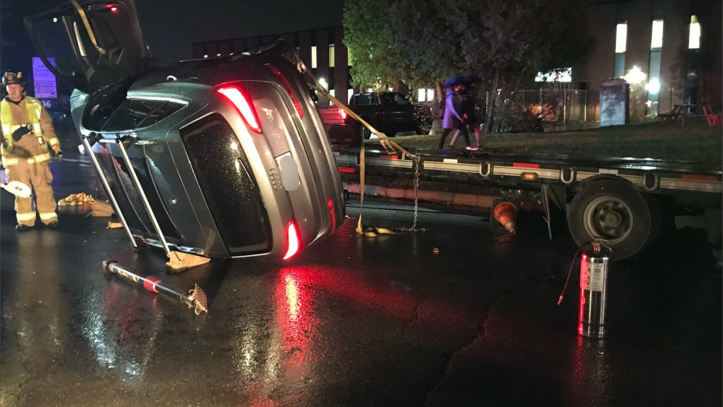 Driver Extricated From Suv After Flipping It Off Flatbed Truck Ctv News