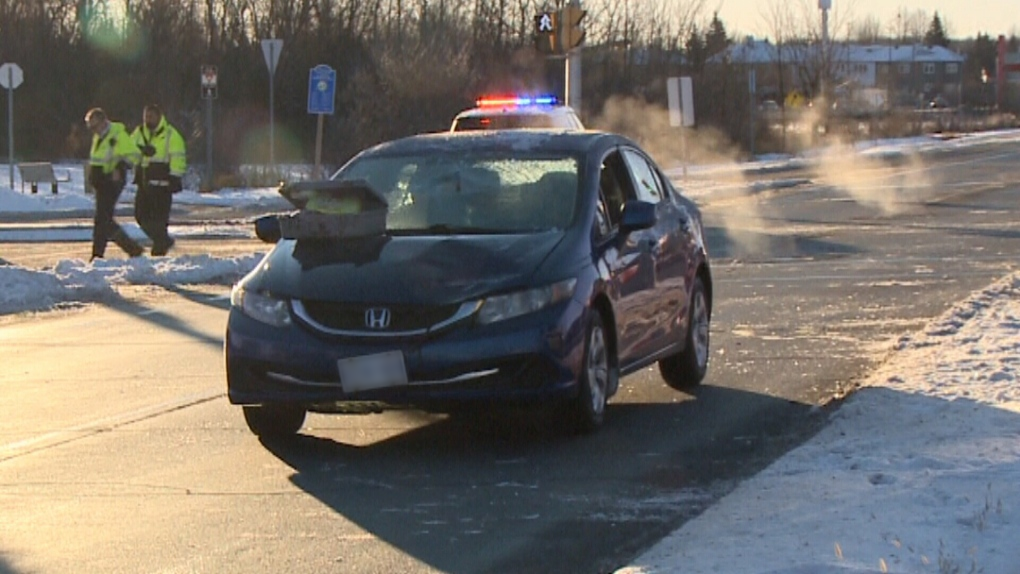 A vehicle at the scene where a pedestrian was struck on Tuesday morning in Barrhaven. (Jim O'Grady/CTV News Ottawa)