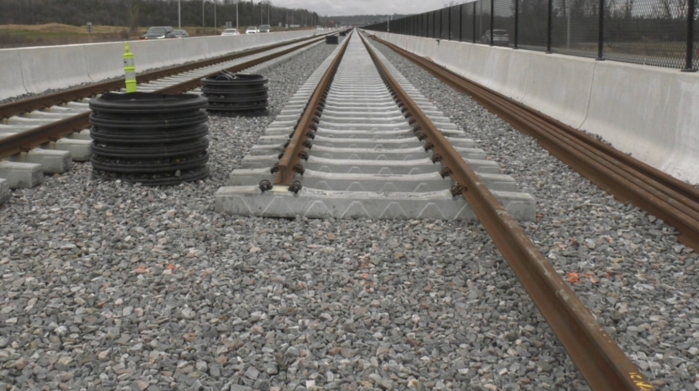 Rail tracks are being laid down as part of the eastern extension of the city's Stage 2 light rail transit project. Labour and supply chain issues are putting pressure on Stage 2, delaying the western extension. (Leah Larocque/CTV News Ottawa)