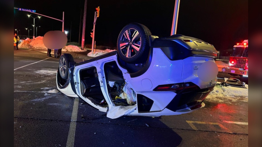 Three people were taken to hospital after a two-car crash in Ottawa's east end Monday night that left one vehicle flipped upside down. (Ottawa Fire Services)