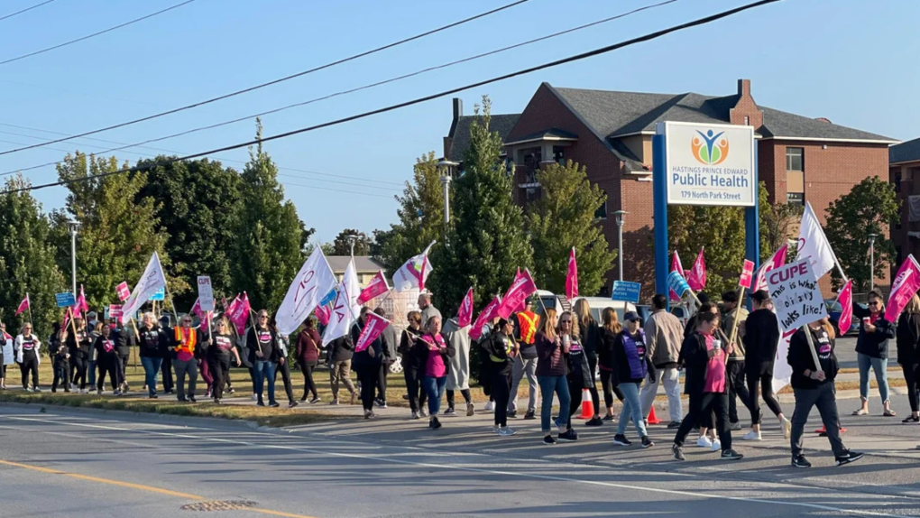 Workers holding picket signs outside of the Hastings Prince Edward Public Health office in Belleville, Ont. are seen in this undated photo. (CUPE Local 3314/cupe.ca)