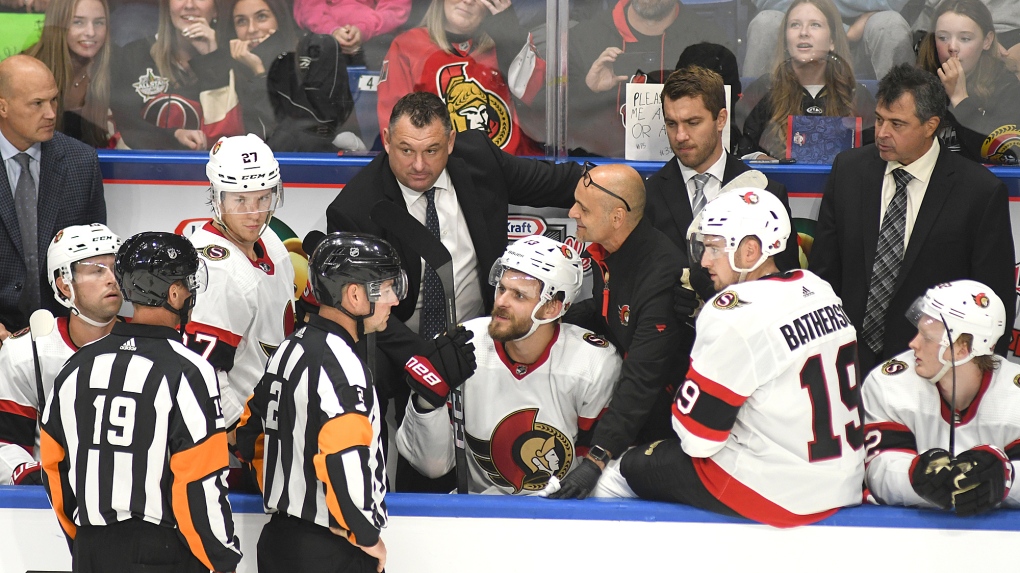 Ottawa Senators Coach D.J. Smith discusses a play during a timeout during third period NHL preseason hockey action against the Florida Panthers, in Sydney, N.S., Sunday, Oct. 1, 2023. (Vaughan Merchant/THE CANADIAN PRESS)