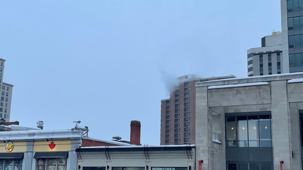 Black smoke coming from the 22nd floor of Les Suites Hotel on Besserer Street on Saturday. (Josh Pringle/CTV News Ottawa) 