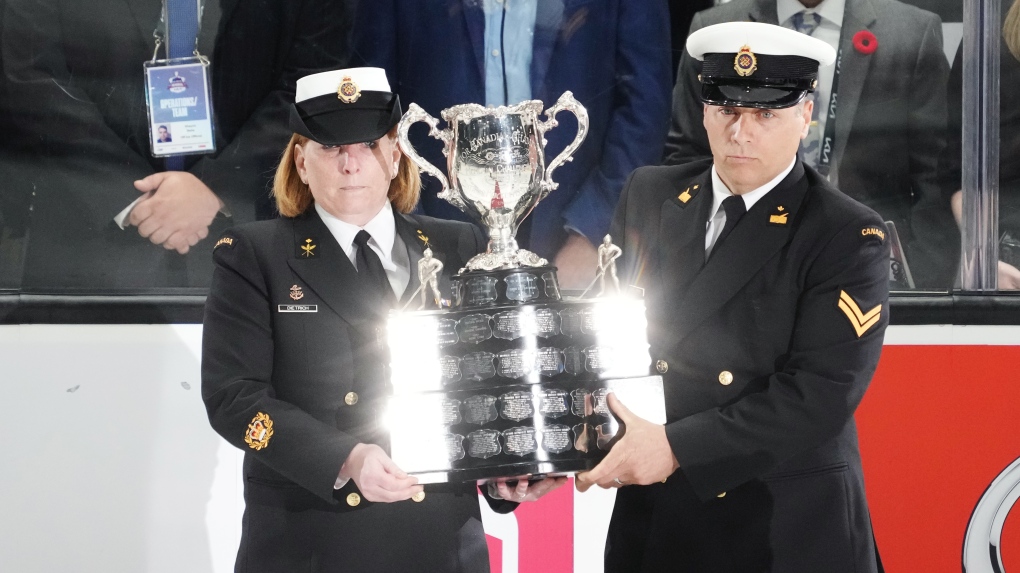 The memorial cup trophy is carried onto the ice prior to the first game of the Memorial Cup championship between the Hamilton Bulldogs and the host Saint John Sea Dogs in Saint John, N.B. on Monday, June 20, 2022. (Darren Calabrese/THE CANADIAN PRESS)