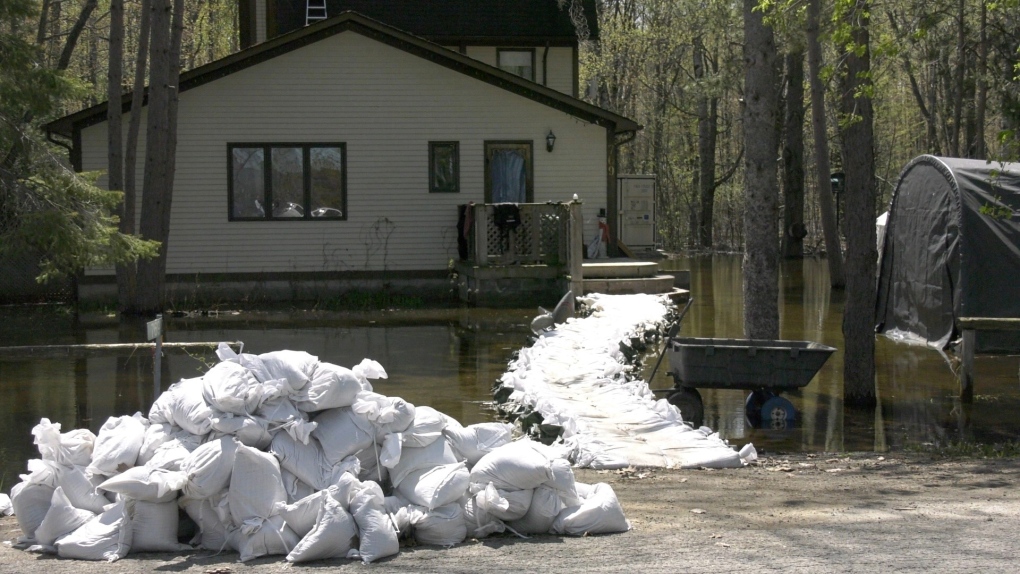 A home in Constance Bay surrounded by water. May 9, 2023. It could be weeks before floodwaters recede. (Dylan Dyson/CTV News Ottawa)