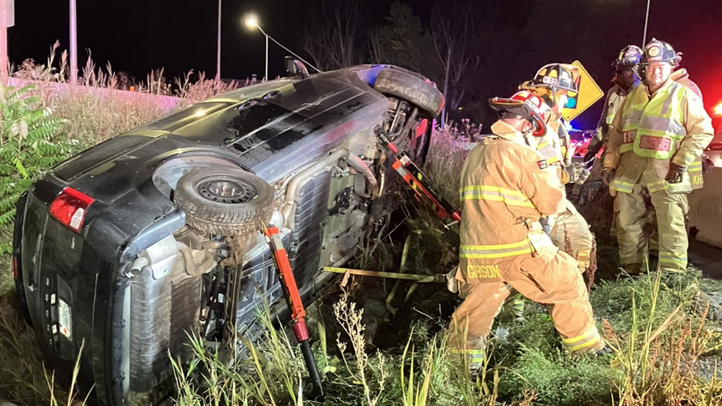 Ottawa firefighters rescued a driver trapped in this vehicle that rolled off Highway 174 near Montreal Road. Sept. 17, 2023. (Ottawa Fire Services)